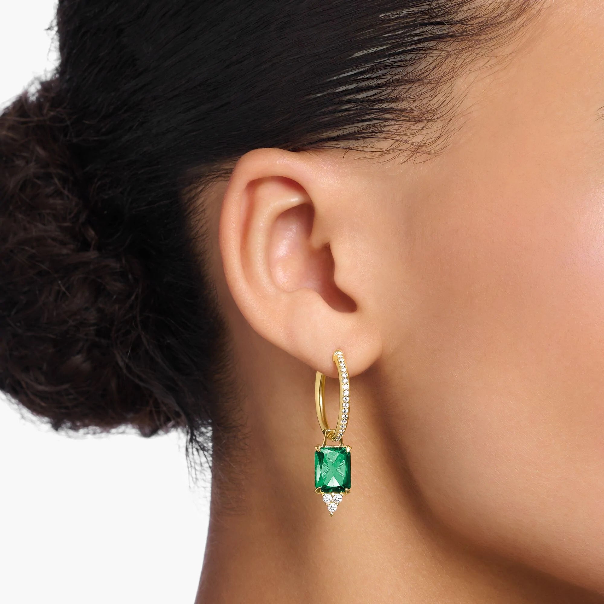 Hoop earrings with green outlet stones